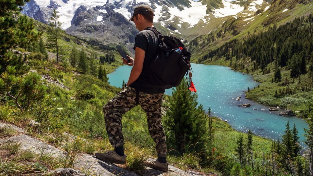 Logistics team member carrying equipment and supplies on the Inca Trail, illustrating the critical support for rapid evacuation and safety protocol implementation – Peru Hikers.