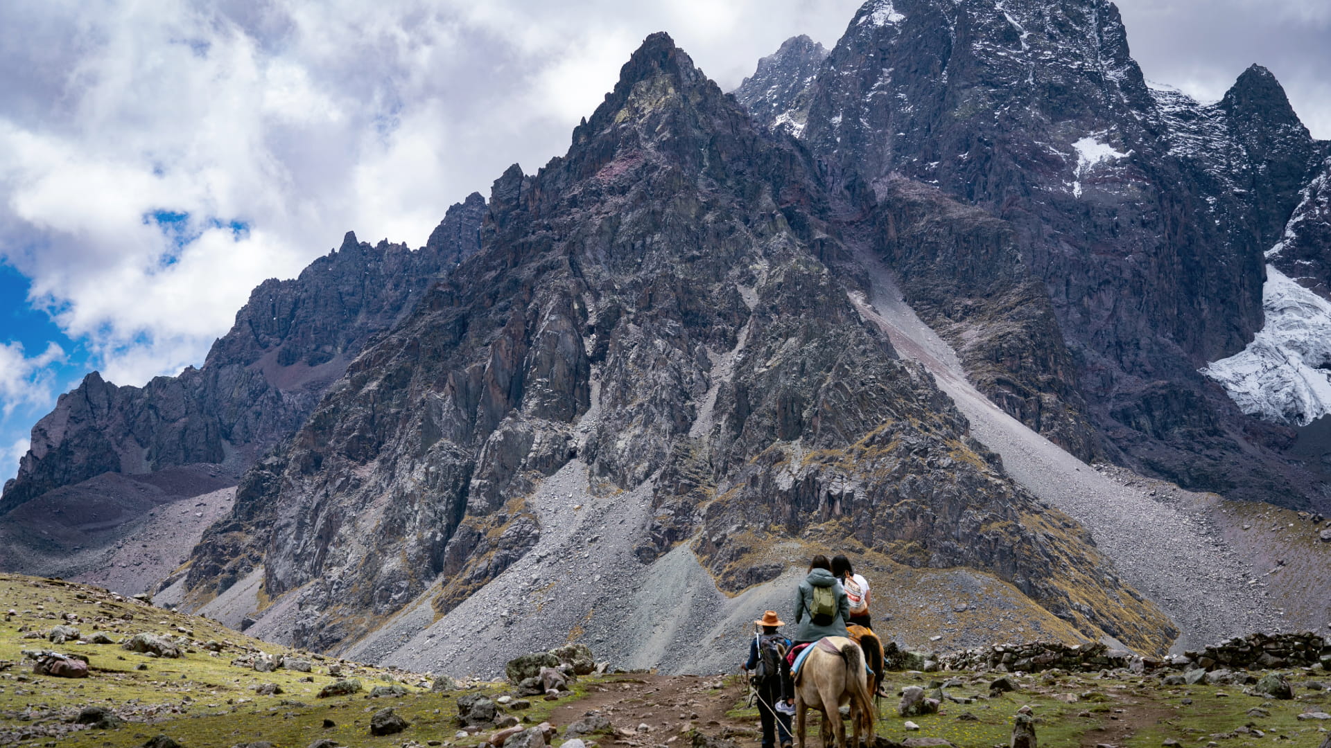 Hiker using a support horse on the Salkantay Trek. Secure vital logistics through early Inca Trail Booking Benefits - Peru Hikers
